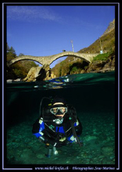 The famous bridge "Ponte dei Salti" on the Verzasca River... by Michel Lonfat 